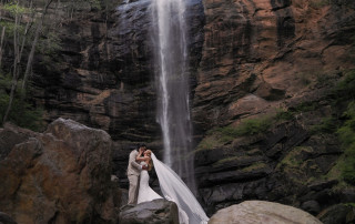 Bride and groom portrait in front of Toccoa Falls