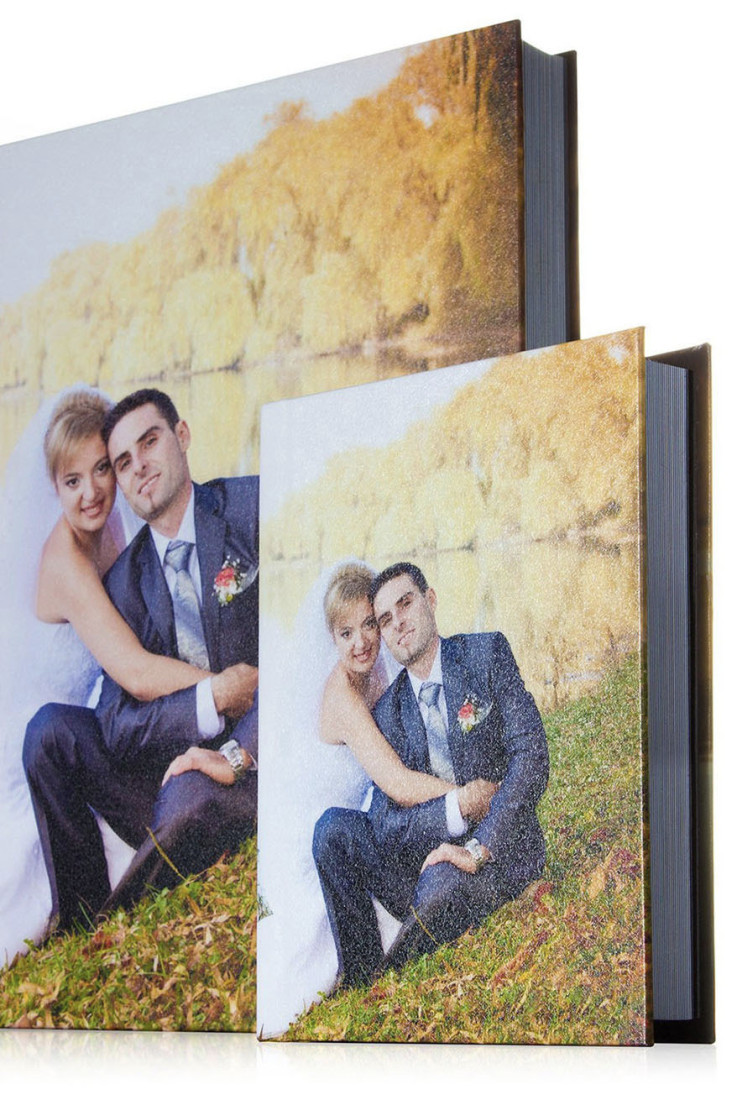 Photos of the printed, hardback cover of our wedding albums