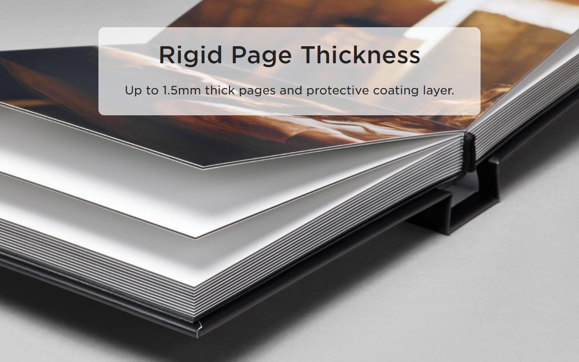 Photos of the thickness of pages of our wedding albums