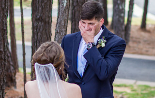 Groom reacts to first look with his bride